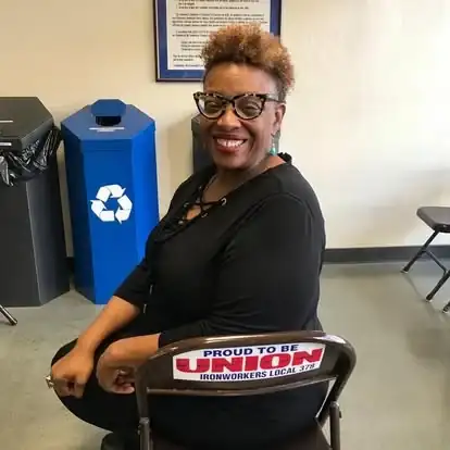 K. Patrice Williams seated on a Proud to Be Union Ironworkers Local 378 chair